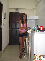 Red haired ladyboy poses in bikini